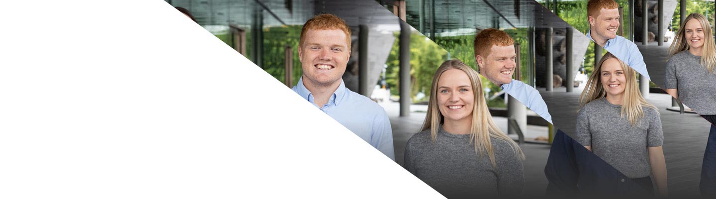 young professional male and female smiling
