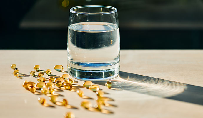 Glass of water with vitamins